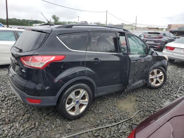 Photo 3 from auction – 2016 FORD ESCAPE SE with VIN 1FMCU9GX2GUA59137