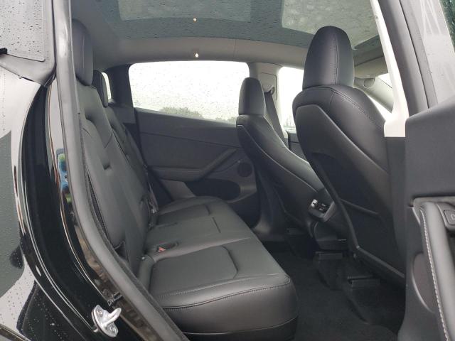Photo 11 from auction – 2024 TESLA MODEL Y with VIN 7SAYGDEEXRF149334