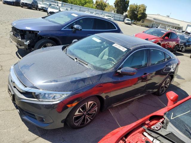 HONDA CIVIC EX 2017 with VIN 19XFC1F36HE211392 - Photo from auction