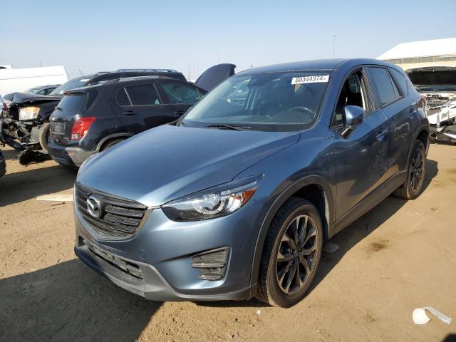 MAZDA CX-5 GT 2016 with VIN JM3KE4DY9G0707584 - Photo from auction