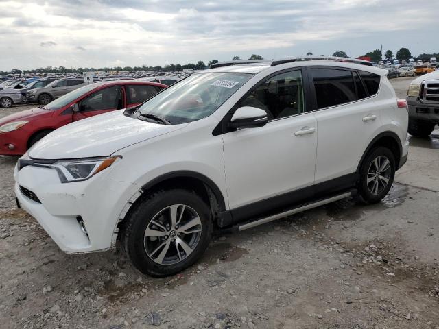 TOYOTA RAV4 XLE 2016 with VIN JTMRFREV1GD186830 - Photo from auction