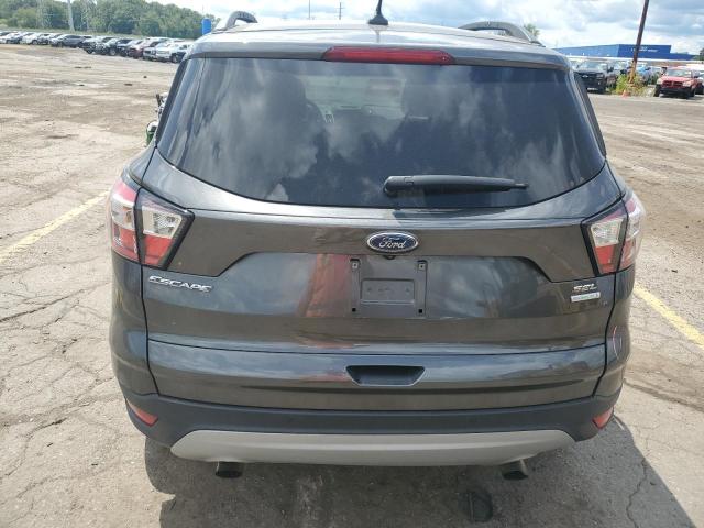 Photo 6 from auction – 2018 FORD ESCAPE SEL with VIN 1FMCU0HD5JUB59966