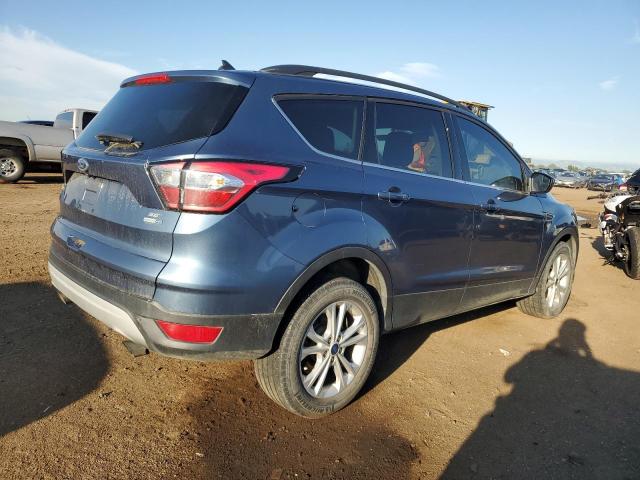 Photo 3 from auction – 2018 FORD ESCAPE SE with VIN 1FMCU9GD4JUC78338
