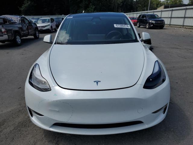 Photo 5 from auction – 2023 TESLA MODEL Y with VIN 7SAYGDEE7PA208978