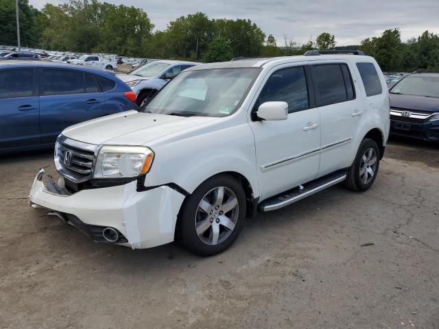 HONDA PILOT TOUR 2015 with VIN 5FNYF4H91FB009442 - Photo from auction