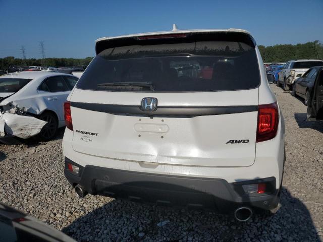 Photo 6 from auction – 2022 HONDA PASSPORT E with VIN 5FNYF8H56NB027860