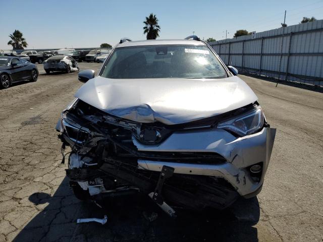 Photo 5 from auction – 2017 TOYOTA RAV4 HV LE with VIN JTMRJREV0HD088730