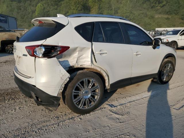 Photo 3 from auction – 2014 MAZDA CX-5 GT with VIN JM3KE4DY4E0343930