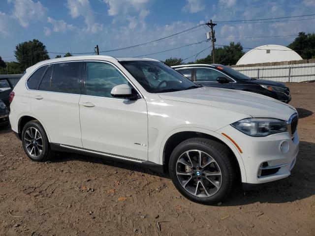 Photo 4 from auction – 2017 BMW X5 XDRIVE3 with VIN 5UXKR0C57H0V65412