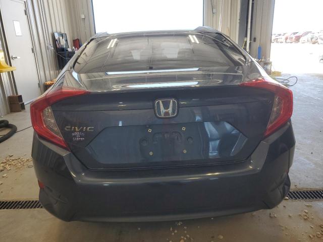 Photo 6 from auction – 2017 HONDA CIVIC LX with VIN 19XFC2F57HE063521