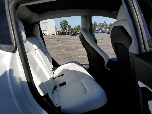Photo 11 from auction – 2020 TESLA MODEL Y with VIN 5YJYGDEE9LF056289