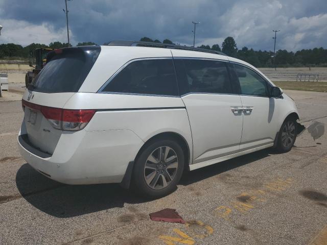 Photo 3 from auction – 2014 HONDA ODYSSEY TO with VIN 5FNRL5H97EB095504