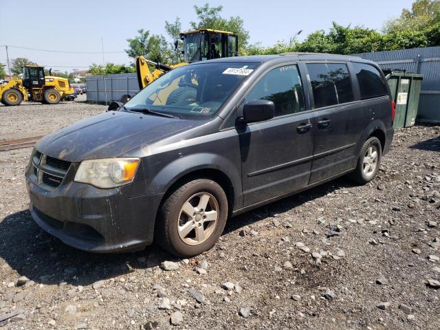 DODGE CARAVAN 2011 with VIN 2D4RN3DG5BR794751 - Photo from auction