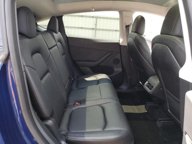 Photo 11 from auction – 2023 TESLA MODEL Y with VIN 7SAYGAEEXPF616120