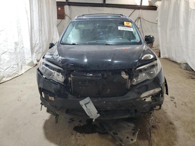 Photo 5 from auction – 2017 HONDA PILOT ELIT with VIN 5FNYF6H02HB041025