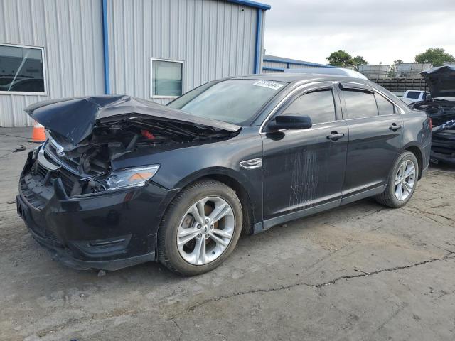 FORD TAURUS SEL 2014 with VIN 1FAHP2E83EG124552 - Photo from auction