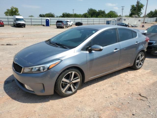 KIA FORTE EX 2017 with VIN 3KPFL4A83HE091023 - Photo from auction