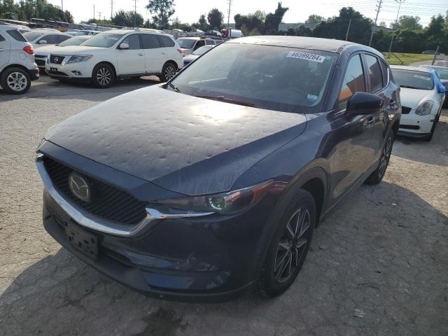 MAZDA CX-5 TOURI 2018 with VIN JM3KFACM7J1444944 - Photo from auction