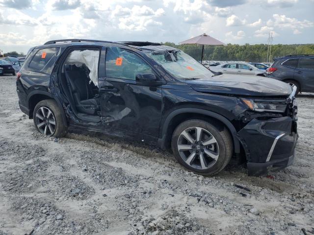 Photo 4 from auction – 2023 HONDA PILOT ELIT with VIN 5FNYG1H89PB004364