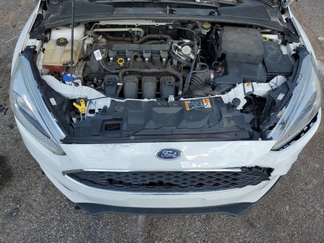 Photo 11 from auction – 2016 FORD FOCUS SE with VIN 1FADP3F20GL385372