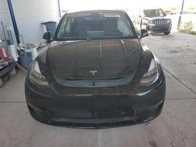 Photo 5 from auction – 2022 TESLA MODEL Y with VIN 7SAYGDEE2NF332379