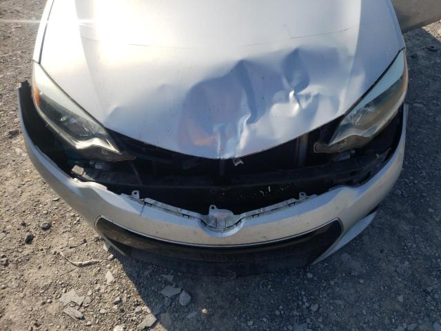 Photo 11 from auction – 2014 TOYOTA COROLLA L with VIN 5YFBURHE8EP101303