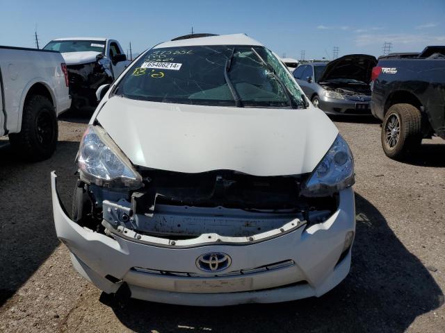 Photo 5 from auction – 2014 TOYOTA PRIUS C with VIN JTDKDTB35E1572981