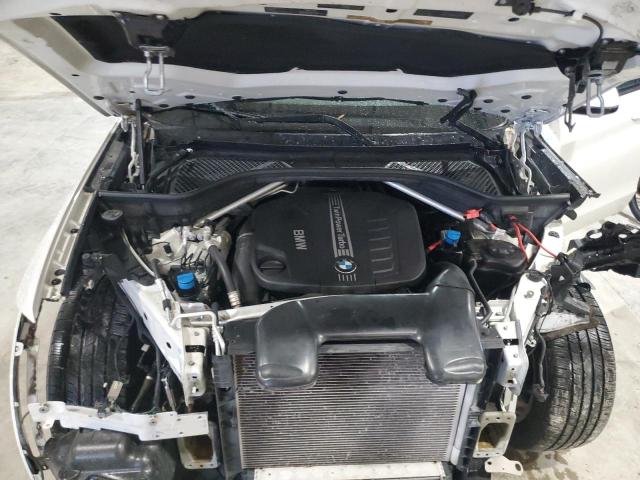 Photo 12 from auction – 2014 BMW X5 XDRIVE3 with VIN 5UXKS4C56E0J93598