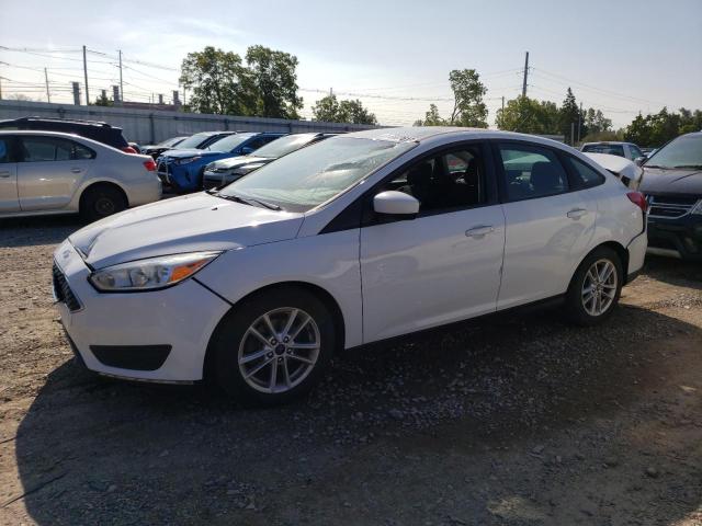 FORD FOCUS SE 2018 with VIN 1FADP3FE2JL302123 - Photo from auction