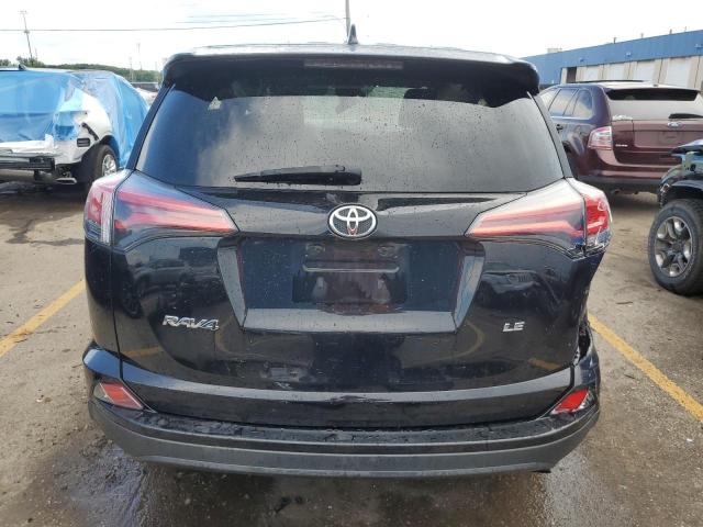 Photo 6 from auction – 2018 TOYOTA RAV4 LE with VIN 2T3ZFREV1JW452180