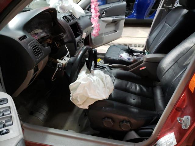 Photo 7 from auction – 2002 MAZDA PROTEGE DX with VIN JM1BJ226421570552