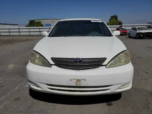 Photo 5 from auction – 2002 TOYOTA CAMRY LE with VIN JTDBE32KX20010080