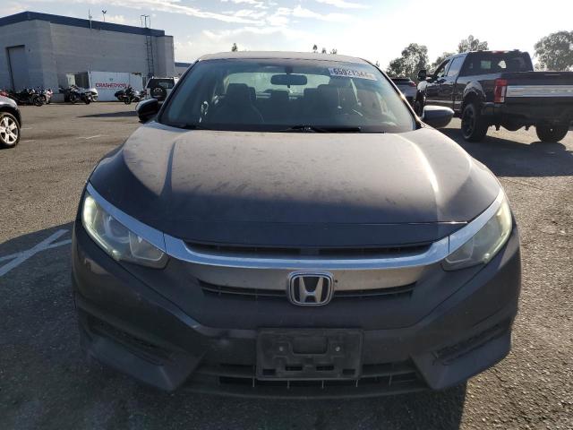 Photo 5 from auction – 2016 HONDA CIVIC LX with VIN 19XFC2F57GE238249