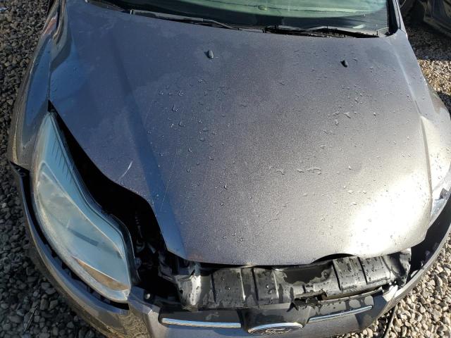 Photo 11 from auction – 2014 FORD FOCUS SE with VIN 1FADP3F2XEL243673