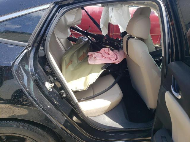 Photo 10 from auction – 2018 HONDA CIVIC LX with VIN 2HGFC2F58JH594061
