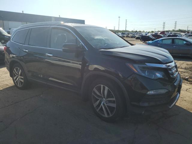 Photo 4 from auction – 2017 HONDA PILOT TOUR with VIN 5FNYF6H9XHB501675