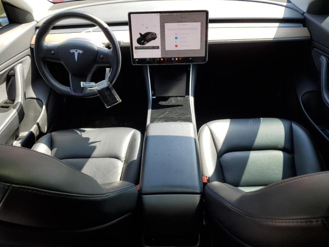 Снимка 8 от търг – 2018 TESLA MODEL 3 с VIN 5YJ3E1EA7JF102873
