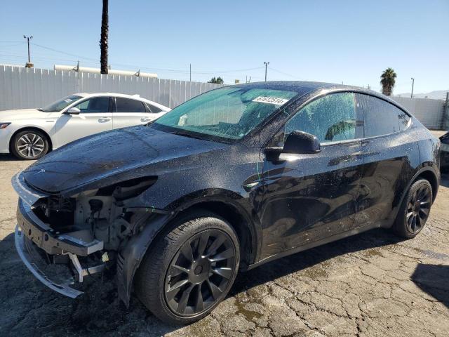 TESLA MODEL Y 2024 with VIN 7SAYGDEE6RA215519 - Photo from auction
