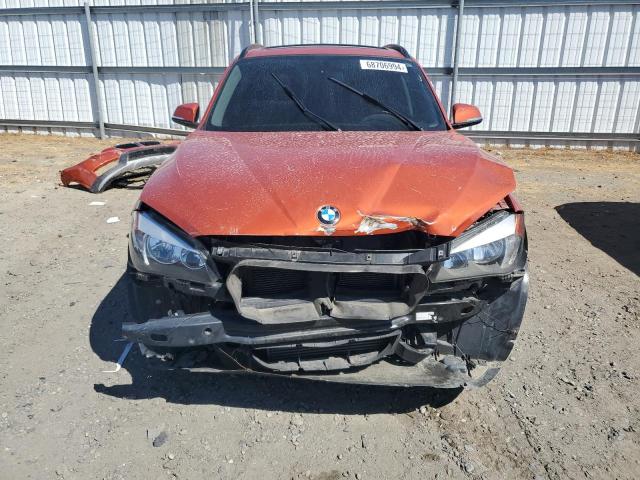 Photo 5 from auction – 2015 BMW X1 SDRIVE2 with VIN WBAVM1C58FV498710