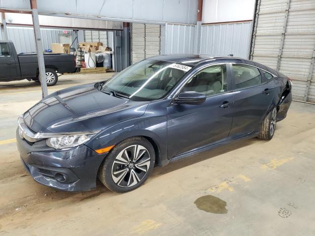 HONDA CIVIC EX 2018 with VIN JHMFC1F32JX044033 - Photo from auction