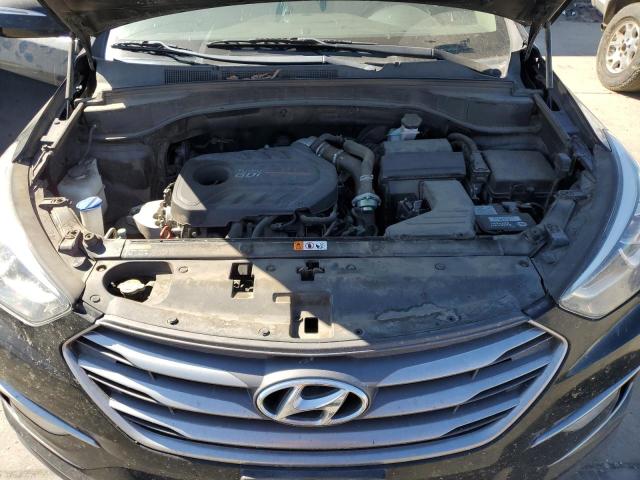 Photo 12 from auction – 2017 HYUNDAI SANTA FE S with VIN 5NMZU4LA5HH040237