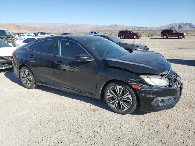 Photo 4 from auction – 2016 HONDA CIVIC EX with VIN 2HGFC1F3XGH654827