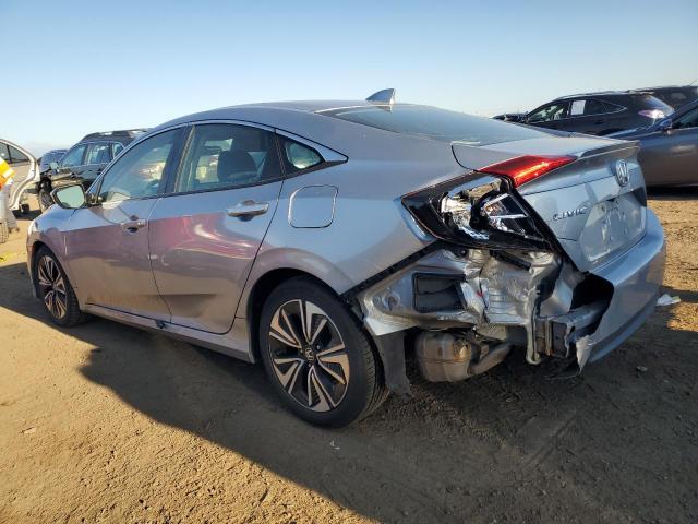 Photo 2 from auction – 2018 HONDA CIVIC EX with VIN JHMFC1F30JX037341