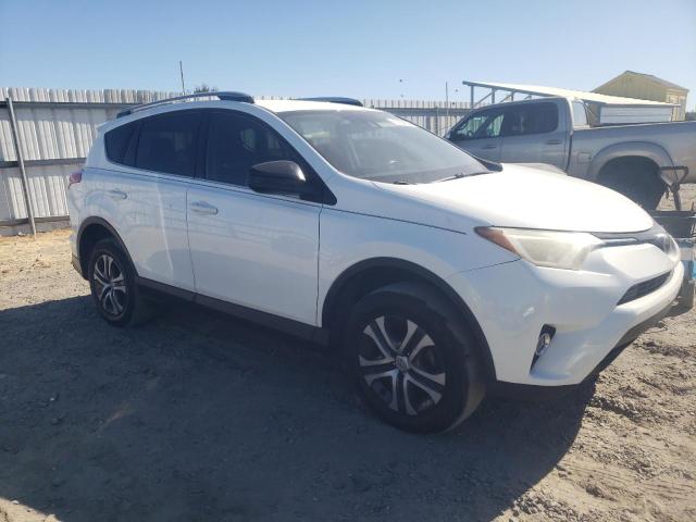 Photo 4 from auction – 2018 TOYOTA RAV4 LE with VIN JTMZFREV8JJ201302