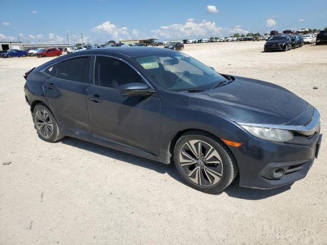 Photo 4 from auction – 2018 HONDA CIVIC EXL with VIN 2HGFC1F74JH640397