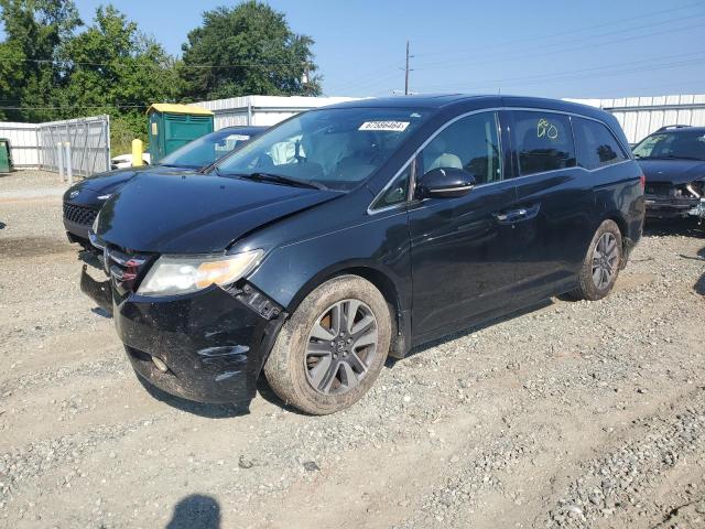 HONDA ODYSSEY TO 2014 with VIN 5FNRL5H93EB077047 - Photo from auction