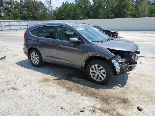 Photo 4 from auction – 2015 HONDA CR-V EXL with VIN 2HKRM3H79FH534091