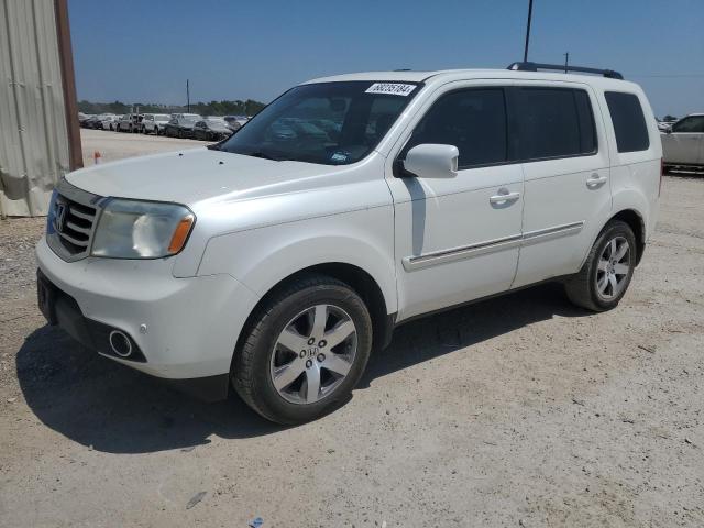 HONDA PILOT TOUR 2014 with VIN 5FNYF3H97EB016100 - Photo from auction