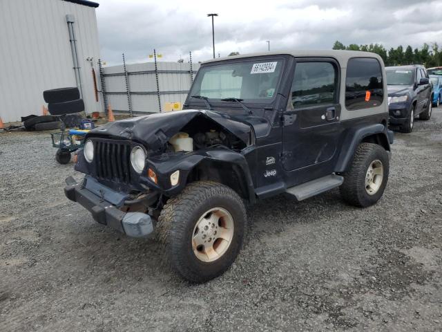 JEEP WRANGLER / 2003 with VIN 1J4FA59S73P308636 - Photo from auction