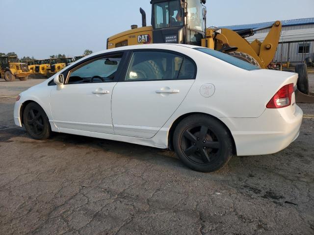 Photo 2 from auction – 2011 HONDA CIVIC LX with VIN 2HGFA1F52BH309985